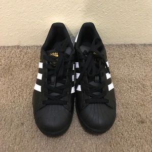 Adidas Superstar Black and gold Size 8 womens